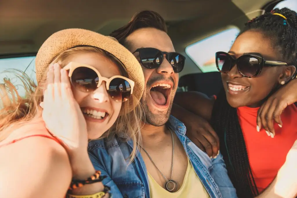 Three friends using Car Subscription Dubai from weareotto